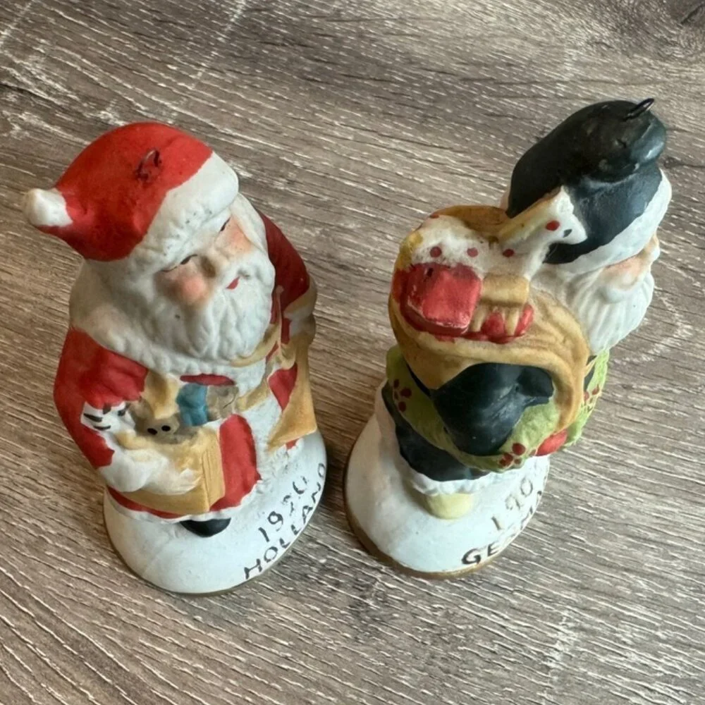 Set of 2, Around The World Collection of Santa Claus Figurine's.